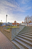 Fototapeta Pomosty - Street view of stairs and Tower in the Old city of Tallinn in Estonia