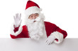 © Blue Jean Images - Santa Claus with blank whiteboard