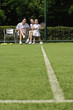 A one child family on the tennis court