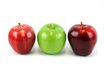 green and red apples on white background