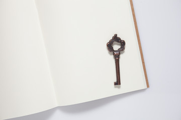 vintage key with notebook