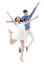 Happy Young Couple Jumping