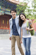 © Blue Jean Images - Young couple travelling at the Lama Temple