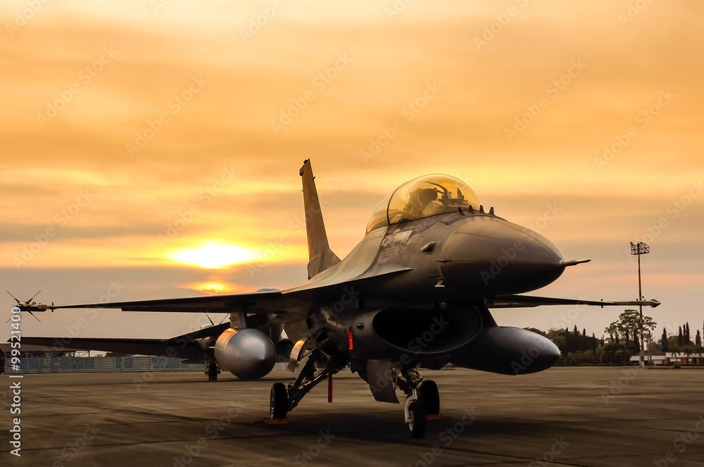 f16 falcon fighter jet on sunset  background  - obrazy, fototapety, plakaty 