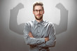 Smiling Businessman with muscular shadow arms