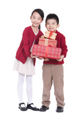 Wall Mural - Happy boy and girl holding gift boxes