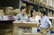 © Blue Jean Images - Happy family shopping