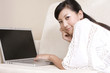 © Blue Jean Images - Asian woman with laptop