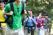 © Blue Jean Images - Young people hiking in mountain