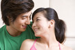 © Blue Jean Images - Asian couple holding each other