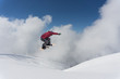 © Vasily Merkushev - Flying snowboarder on mountains. Extreme sport.