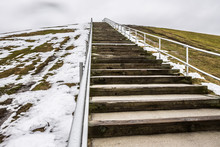 Steps To Top Of Mount Trashmore Park In Virginia Beach, Virginia With Melting Snow.