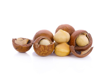 Wall Mural - macadamia nuts isolated on white background