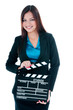 © iPortret - Cute Young Woman Holding Clapper Board