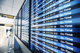 info of flight on billboard in airport