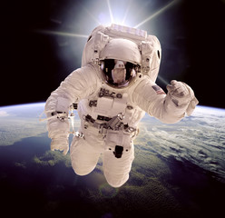 Wall Mural - astronaut in outer space