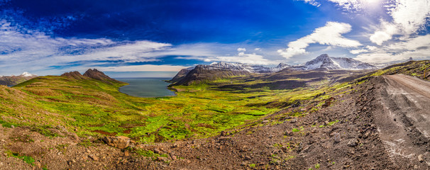 Wall Mural - panorama of valley with the arctic sea and the mountains in iceland