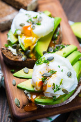 Sandwich with avocado and poached egg