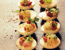 Deviled Eggs Appetizer With Avocado And Bacon