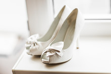 White Wedding Shoes With A Bow