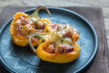 Canvas Print - Stuffed peppers with sausages and mozzarella topping