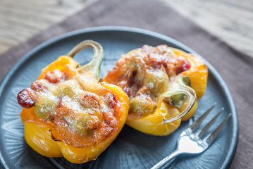 Canvas Print - Stuffed peppers with sausages and mozzarella topping