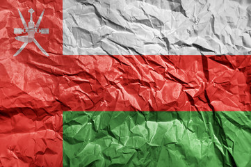 Wall Mural - Oman flag painted on crumpled paper background