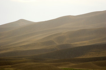 Wall Mural - Thunderstorm over sand dunes