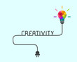 Creativity and idea concept with colorful polygonal lightbulb and wire
