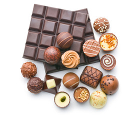 various chocolate pralines and chocolate bar