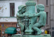 Figures of children playing