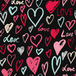 Seamless pattern with hand drawn heart. Black background.