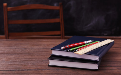 Sticker - Books and school accessories on wooden table