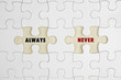 © annuar83 - Jigsaw puzzle on wood background with a word ALWAYS and NEVER