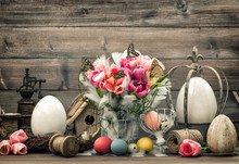 Easter Decoration With Pink Tulips And Colored Eggs