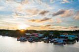 Fototapeta Boho -  Landscape of fishermen village beside the sea canal in southern of Thailand.