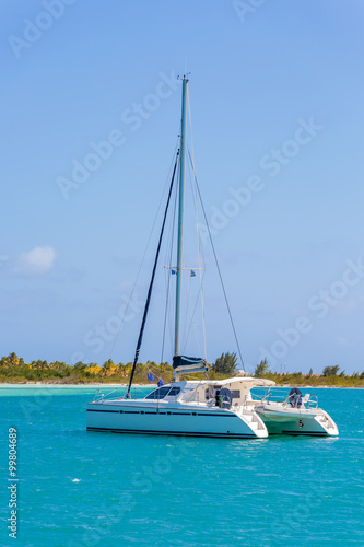 Fototapeta na wymiar Catamaran at the tropical beach of Cuba