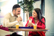 © ivanko80 - Couple eating in fast food restaurant