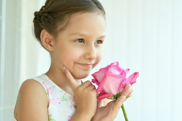 Wall Mural - little girl with rose flower