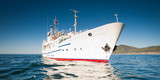 Fototapeta  - White ship in the water of lake Baikal