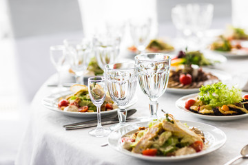 Empty glasses  in restaurant. Banquet table set