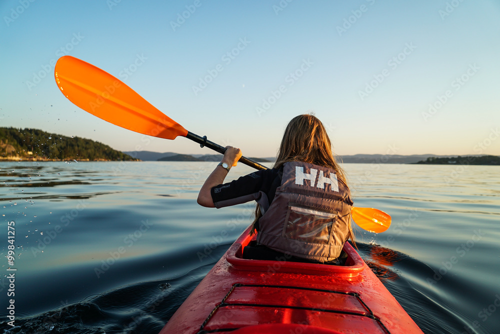 Obraz na płótnie A girl Canoeing in the fjord of Oslo w salonie