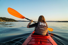 A Girl Canoeing In The Fjord Of Oslo