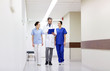 © Syda Productions - group of medics at hospital with clipboard