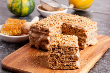 Wall Mural - delicious honey cake on a desk close-up