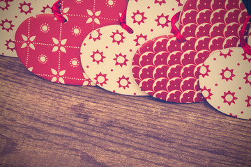 Valentines Day background, red and white hearts on wooden backgr