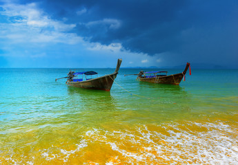 Weather changes with storm clouds and rain on Thailand beach