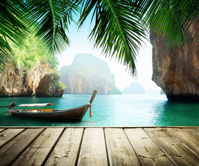 Wall Mural - Adaman sea and wooden boat in Thailand