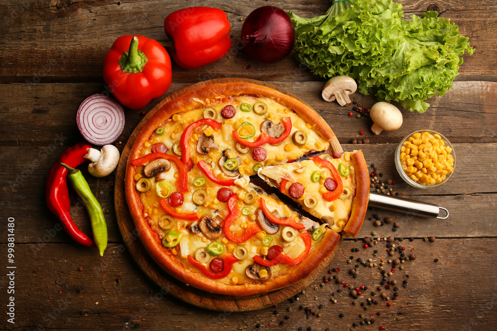 Delicious pizza with vegetables and slice on shovel, close-up