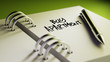 © xtock - Closeup of a personal agenda setting an important date writing w